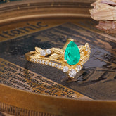 Nature-Inspired Pear-Cut Emerald Couple's Engagement Ring Set